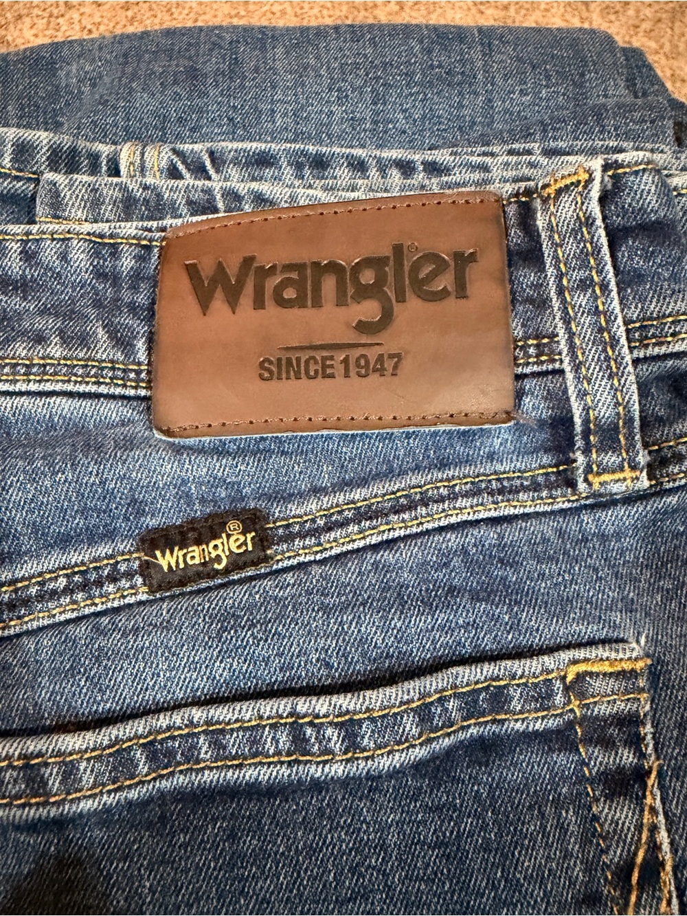 Wrangler Blue Denim Jeans with Brown Leather Patch